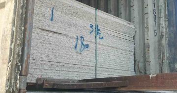 甘肃 芝麻白花岗岩石材3.0公分光面毛板装柜出货