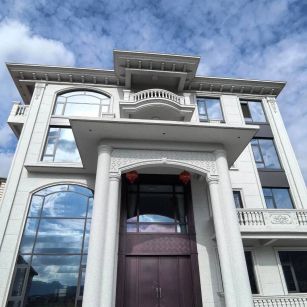 甘肃白麻别墅外墙干挂石材效果示例