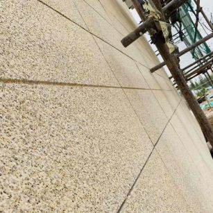 甘肃 黄金麻花岗岩荔枝面外墙干挂石材效果示例