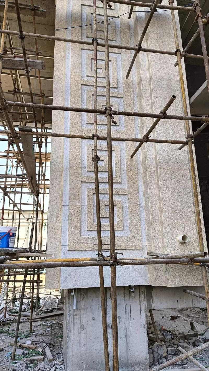 甘肃 黄金麻花岗岩别墅外墙干挂回纹造型效果