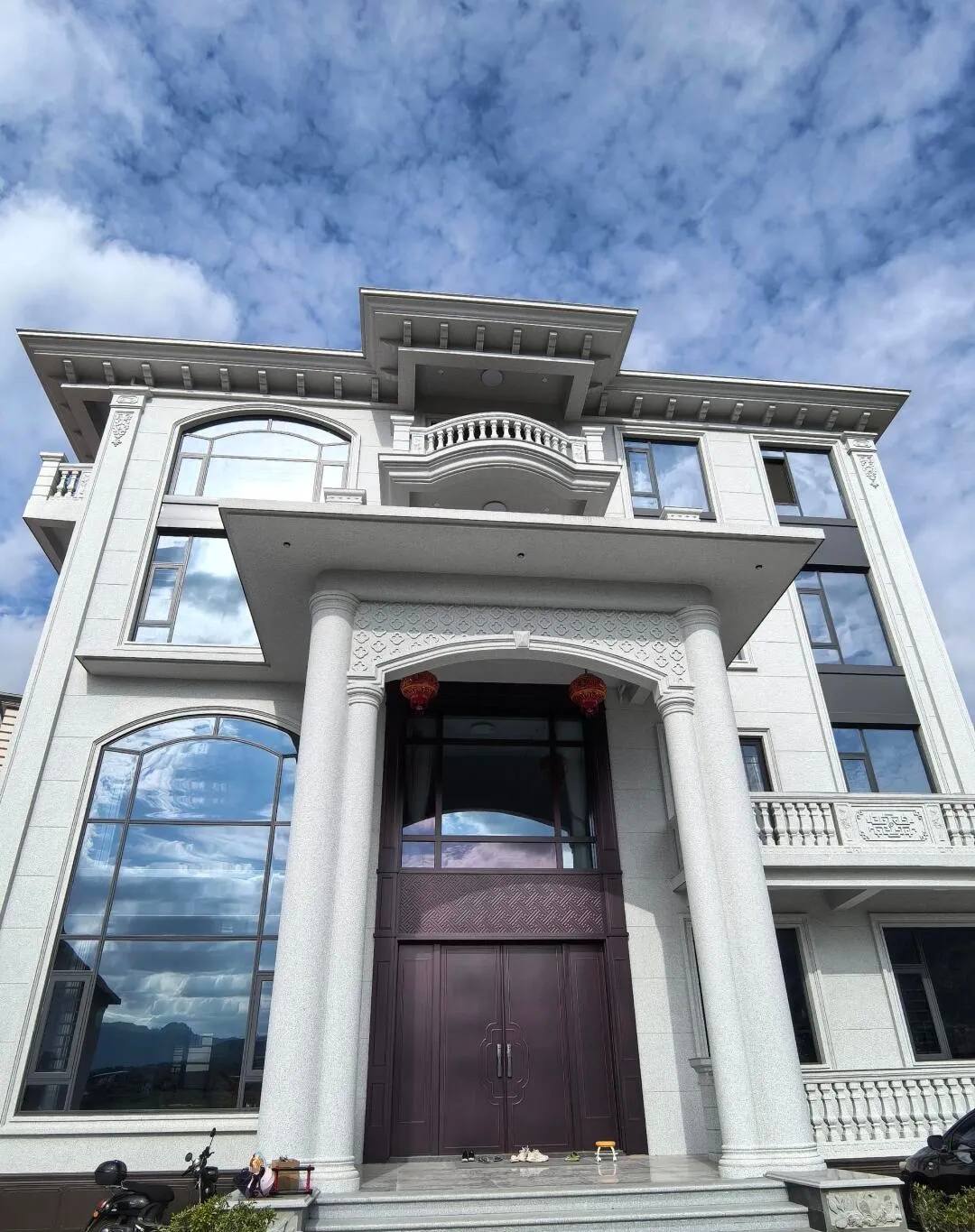 甘肃白麻别墅外墙干挂石材效果示例