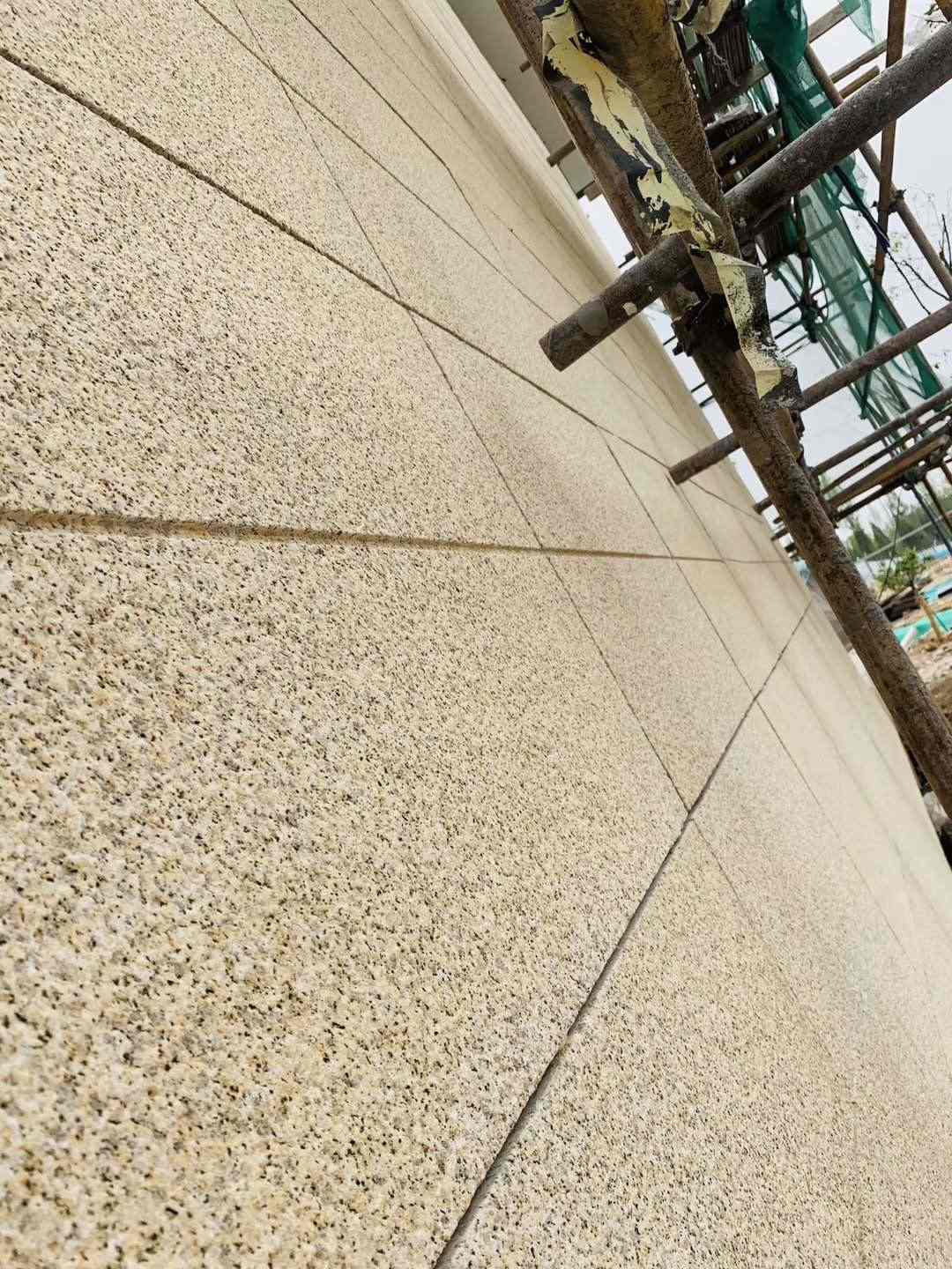 甘肃 黄金麻花岗岩荔枝面外墙干挂石材效果示例